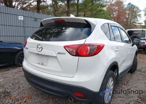 2013 Mazda Cx-5 Touring z USA, uszkodzony, nr VIN JM3KE2CE8D0135849